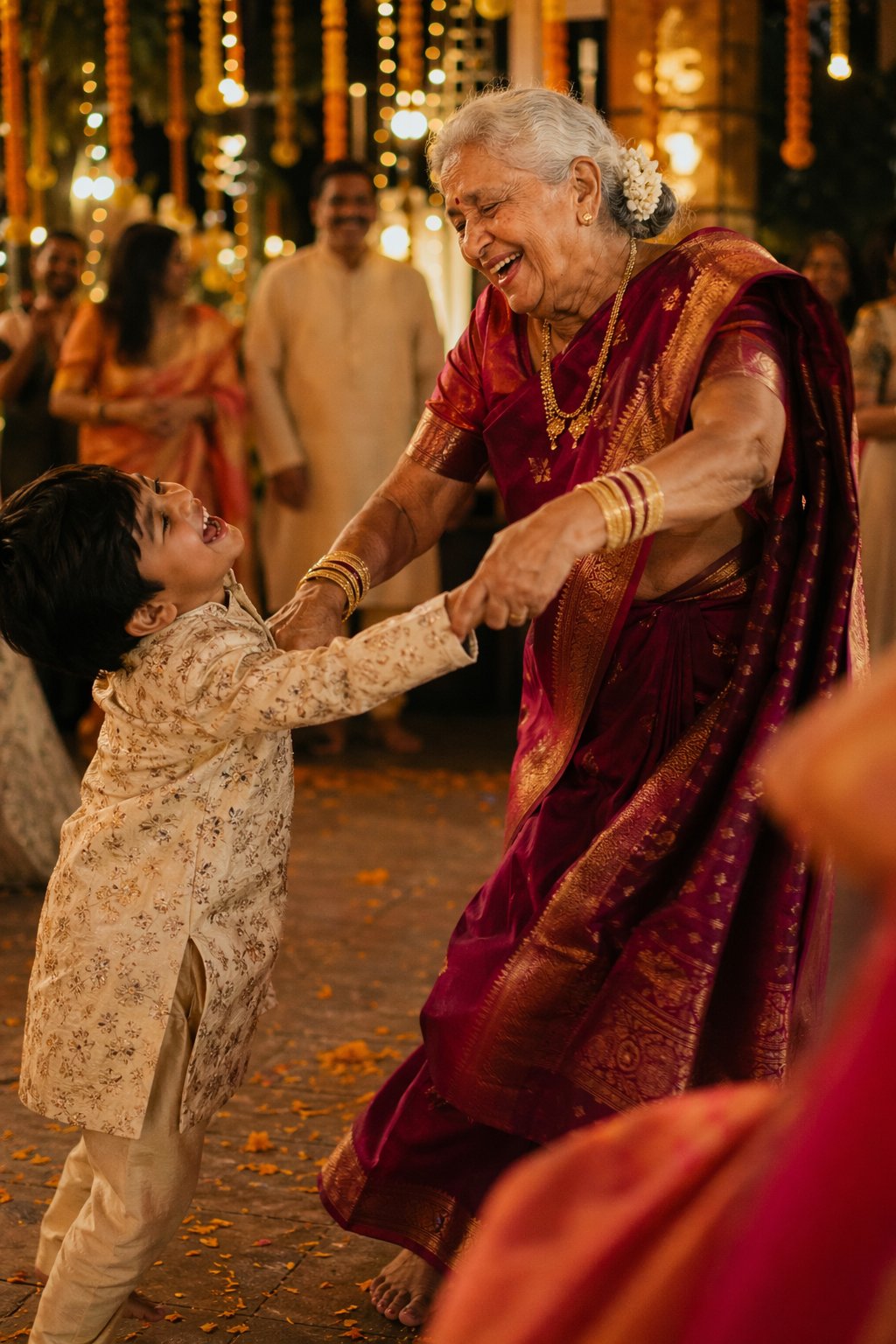 Grandmother dancing with grandchild at an Indian wedding — GPT Image 2
